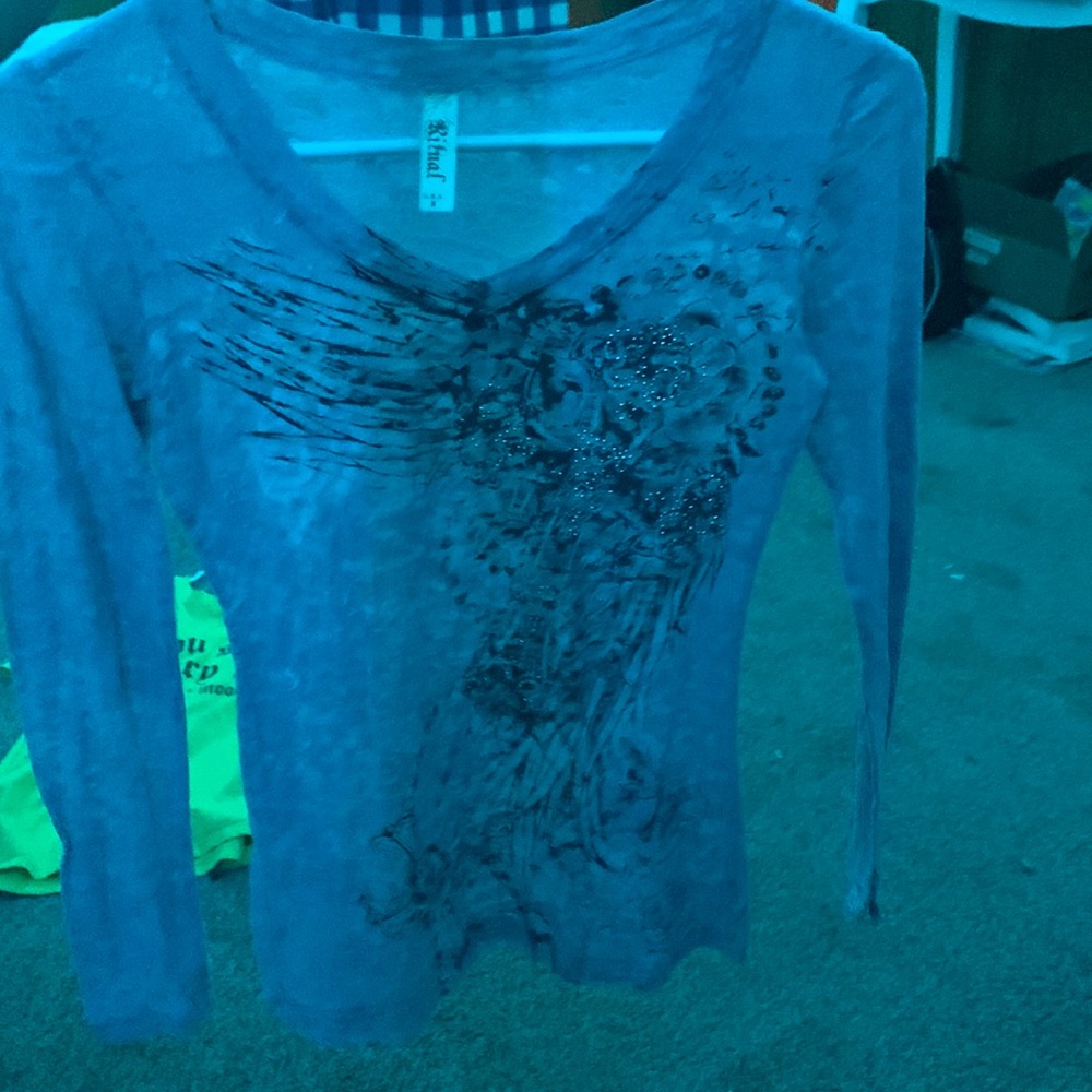 A long sleeve ritual shirt